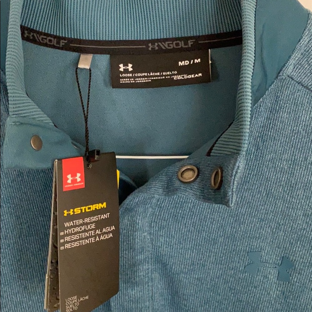 Brand new w tags Under Armour Golf pullover